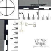 1.01 ctw natural diamond platinum stud earrings scale