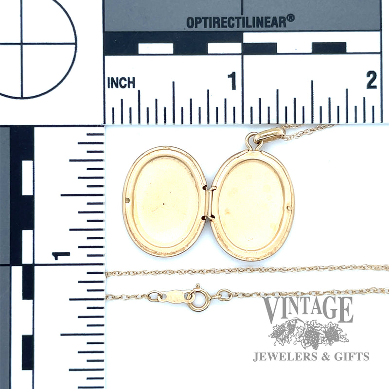 Oval 14k gold locket necklace