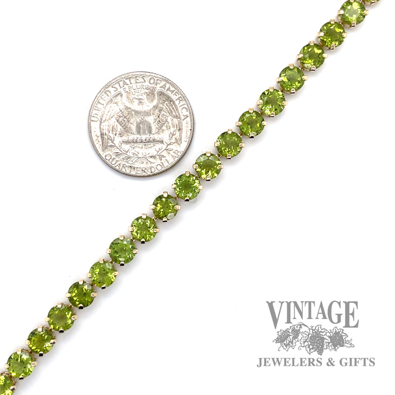 7.5" Peridot 14k gold tennis bracelet scale