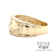 Claddagh 14k gold and diamond ring  band side1