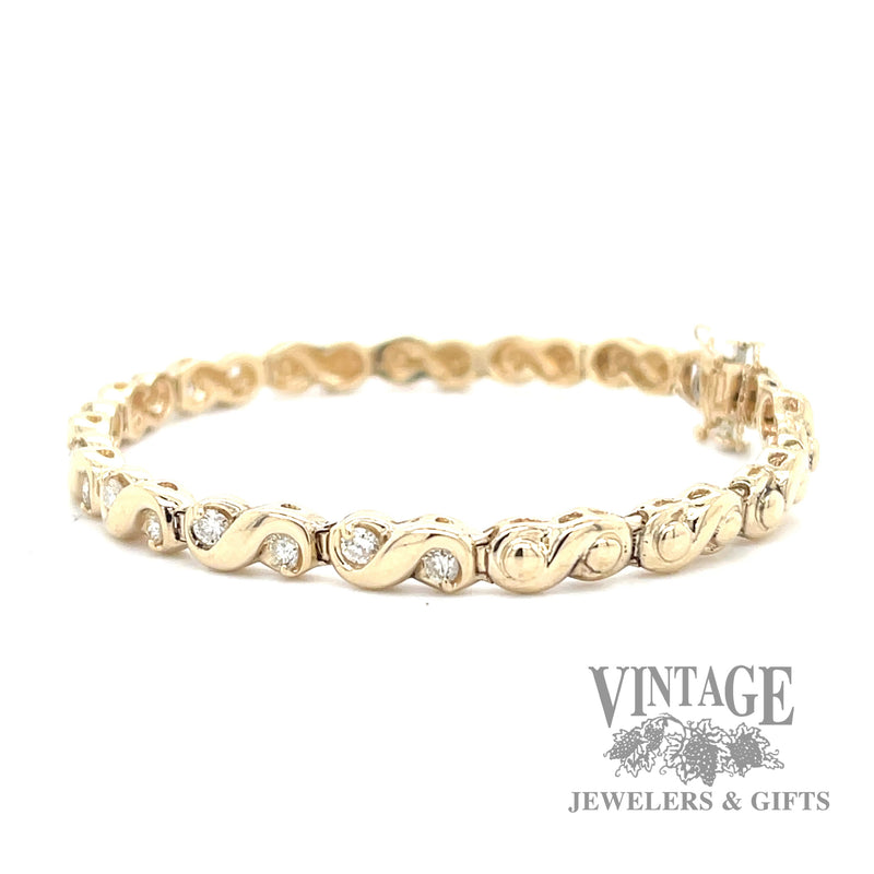 7" Scroll 14k gold and diamond bracelet