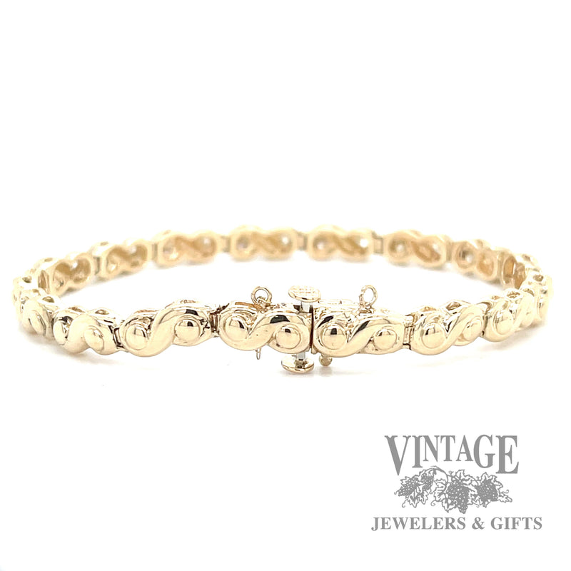 7" Scroll 14k gold and diamond bracelet