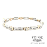 7.25" two tone 14k gold and diamond bracelet side1