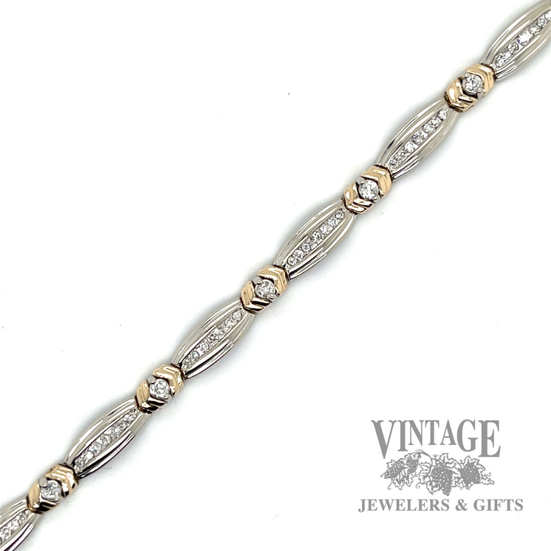 7.25" two tone 14k gold and diamond bracelet