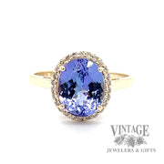 Tanzanite and diamond 10k gold halo ring
