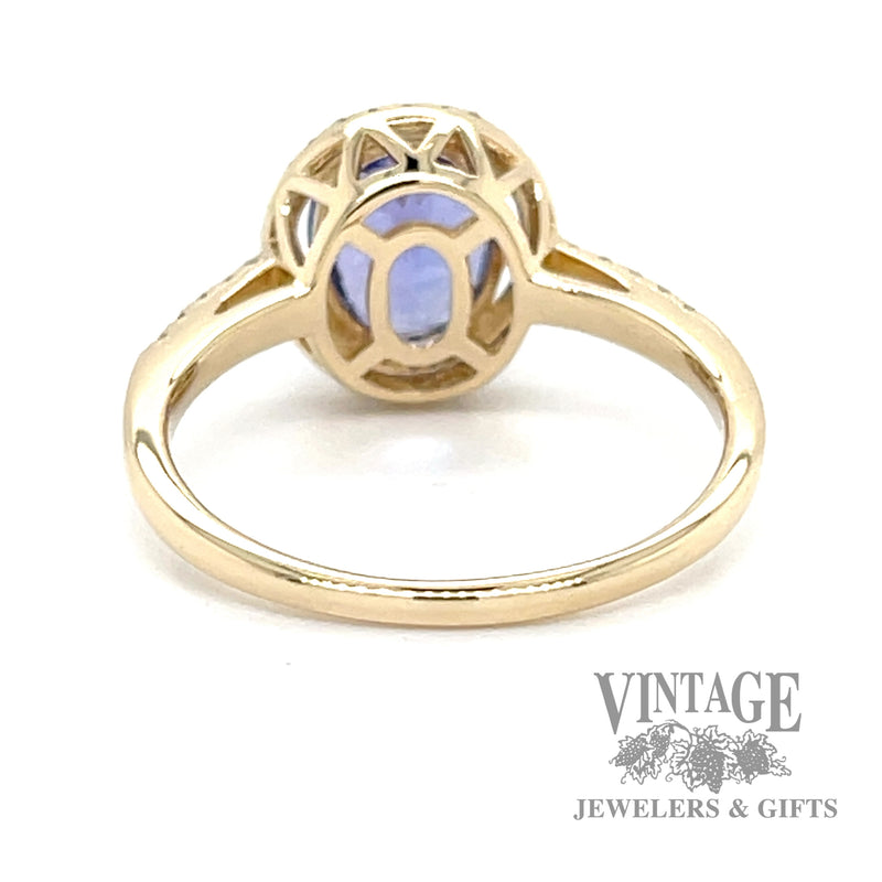 Tanzanite and diamond 14k gold halo ring