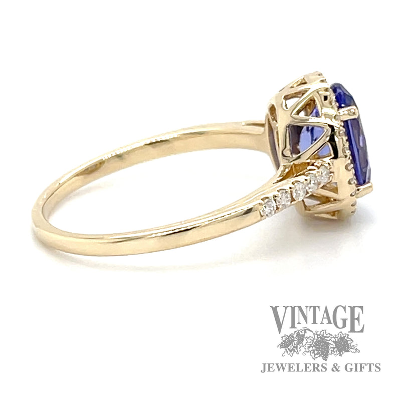 Tanzanite and diamond 14k gold halo ring
