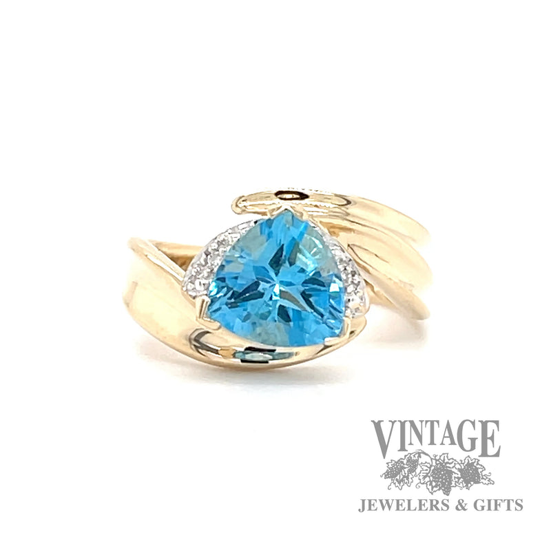 Blue topaz and diamond 14k gold bypass ring