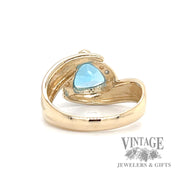 Blue topaz and diamond 14k gold bypass ring bottom