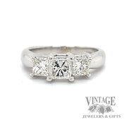 1.11 CTW natural diamond three stone 14k gold and Platinum ring