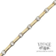 Twist 14k two tone diamond link station bracelet