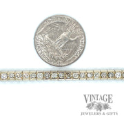 Channel set diamond line 14k gold bracelet scale