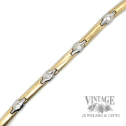 Contemporary 14k two tone gold and diamond link bracelet