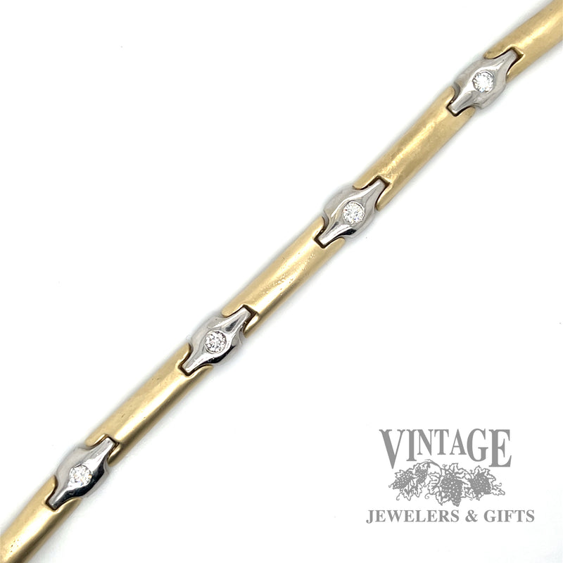 Contemporary 14k two tone gold and diamond link bracelet
