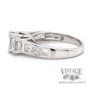 Emerald cut three stone natural diamond 14kw gold ring with accented shank side1