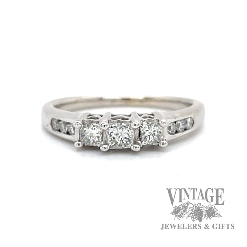 Princess cut natural diamond three stone 14kw gold ring with accented diamond shoulders