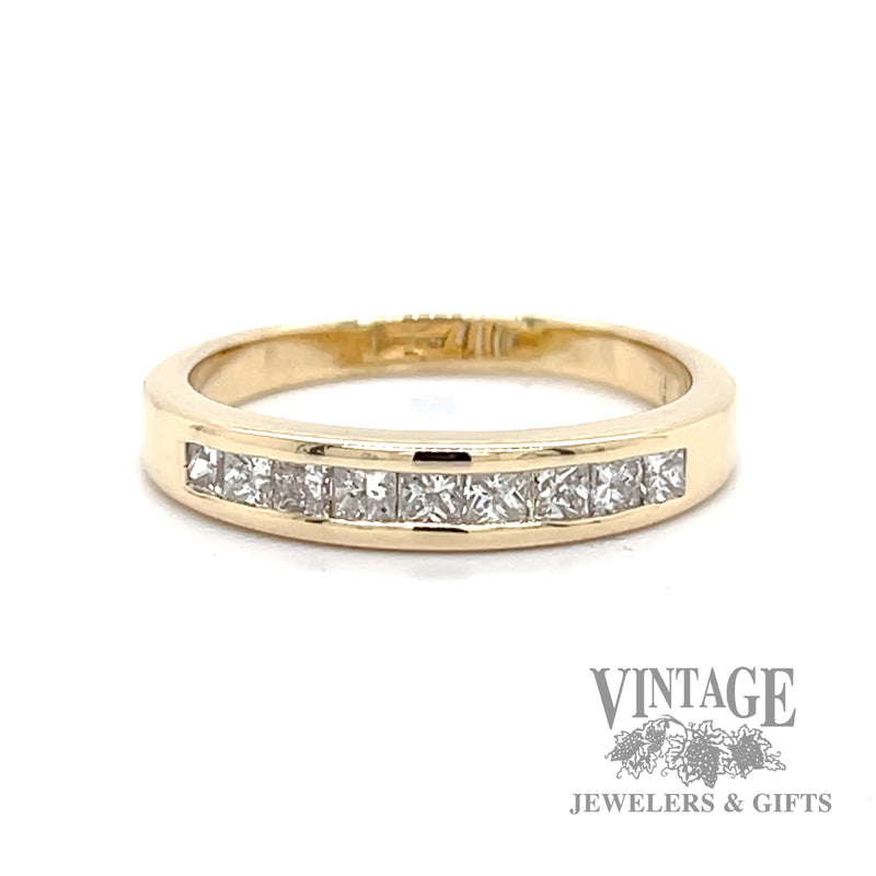 Diamond princess cut 14k channel set ring band.