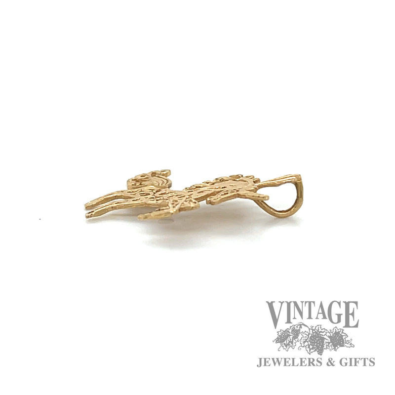 Filigree cutout Unicorn 14k gold pendant side