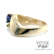 Pear shaped sapphire and diamond 14k gold bypass ring side two