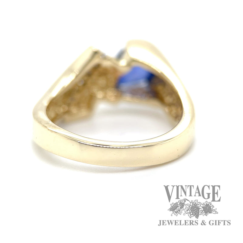 Pear shaped sapphire and diamond 14k gold bypass ring bottom