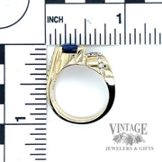 Pear shaped sapphire and diamond 14k gold bypass ring scale