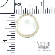 Low domed 14k gold wide tapered ring band scale