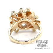 Diamonds in a 14k gold bow ring bottom