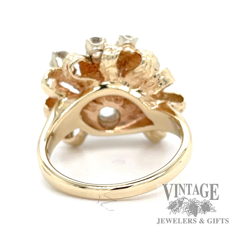 Diamonds in a 14k gold bow ring bottom