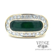 Jadeite saddle 18k gold diamond halo ring.