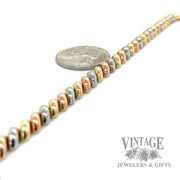 7.75" San Marcos Link 14k Tri-gold bracelet scale