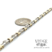7.5" Tennis Link w/ Diamonds accents 10k gold bracelet side scale