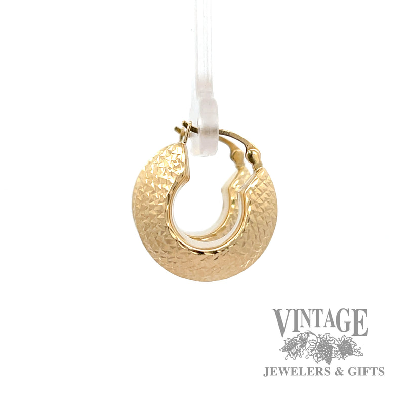 Textured hoop 14k yellow gold earrings left