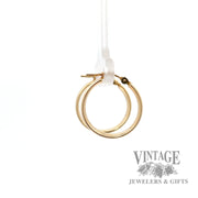 Huggie 14k yellow earrings left