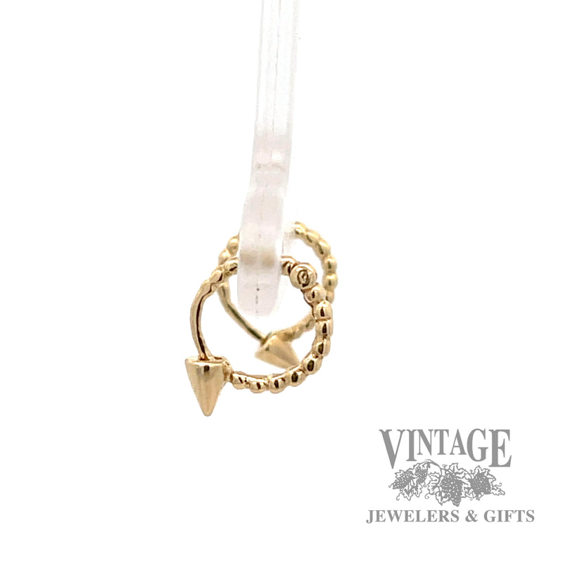 Huggie 14k yellow gold earrings left