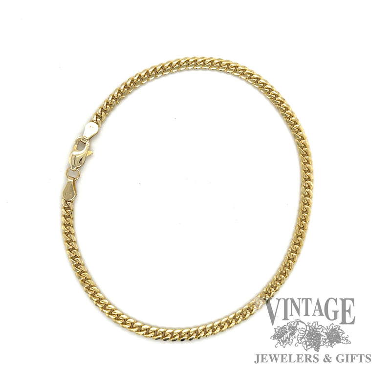 8.25" Curb link 10k yellow bracelet round