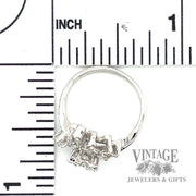 Botanical motif cluster 14k white gold diamond ring scale