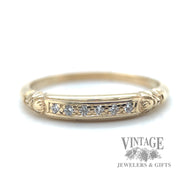 petite channel diamond set 14kt gold ring  