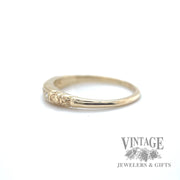 petite channel diamond set 14kt gold ring  left