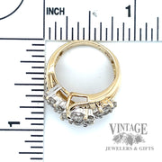 Bypass 3 stone accented 14k gold ring scale