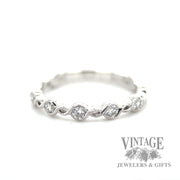 Vintage inspired infinity 14k white gold Natural Diamond twist ring macro