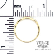 Ruby and natural diamond accented 14kt gold ring .14tw scale