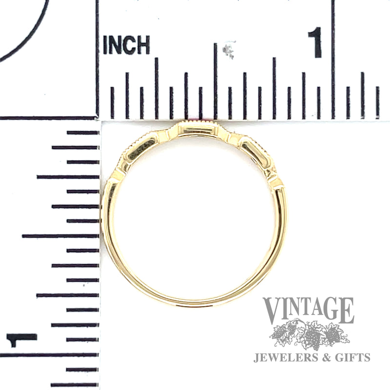 Ruby and natural diamond accented 14kt gold ring .14tw scale