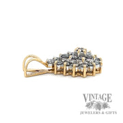 Pine Cone Shaped Natural Diamond 14k gold pendant laying down