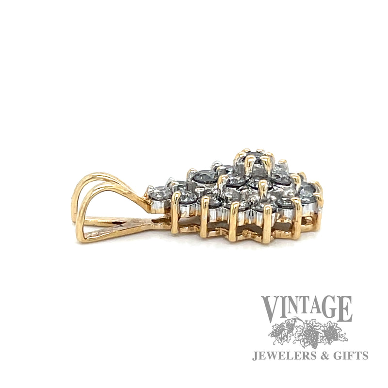 Pine Cone Shaped Natural Diamond 14k gold pendant laying down