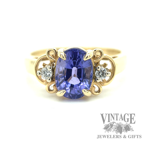 Oval Tanzanite and diamond 14k gold 3 stone ring macro