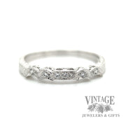 Engraved 18k white gold ring macro