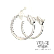 Huggie style natural diamond 14k white gold earrings .5ct left