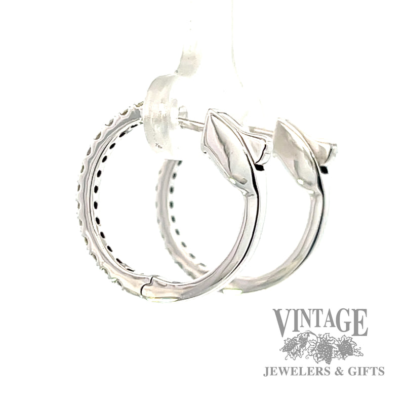 Huggie style natural diamond 14k white gold earrings .5ct left