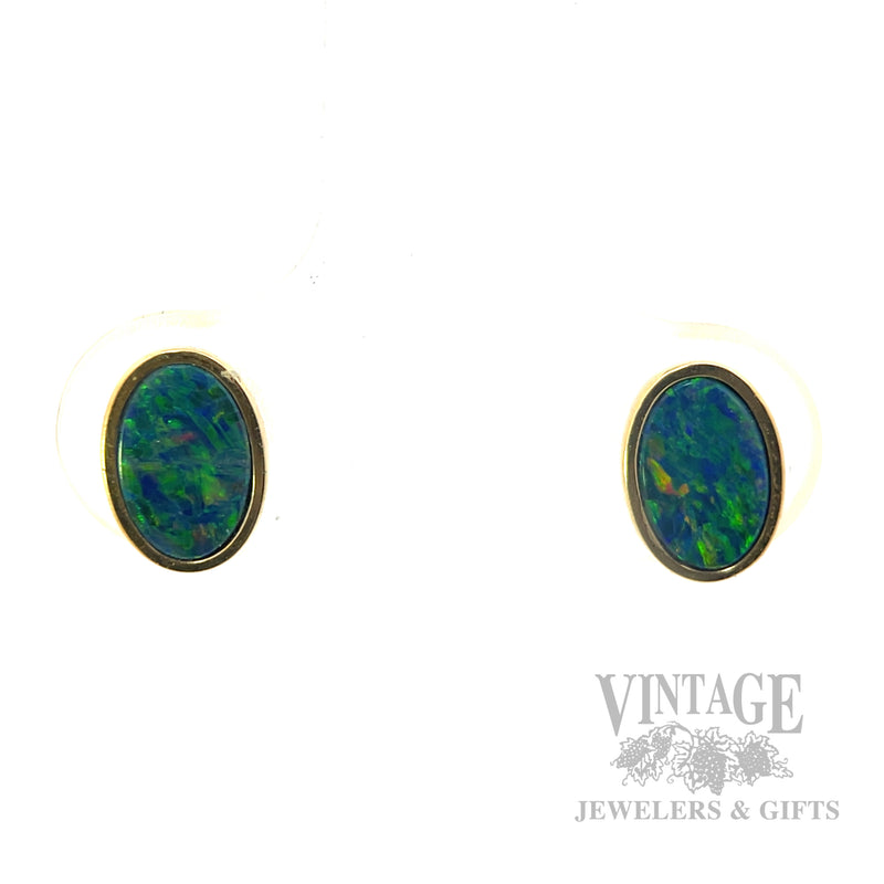 Oval opal 18k gold stud earrings front