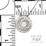 Hearts on Fire diamond swirl 18k white gold pendant scale